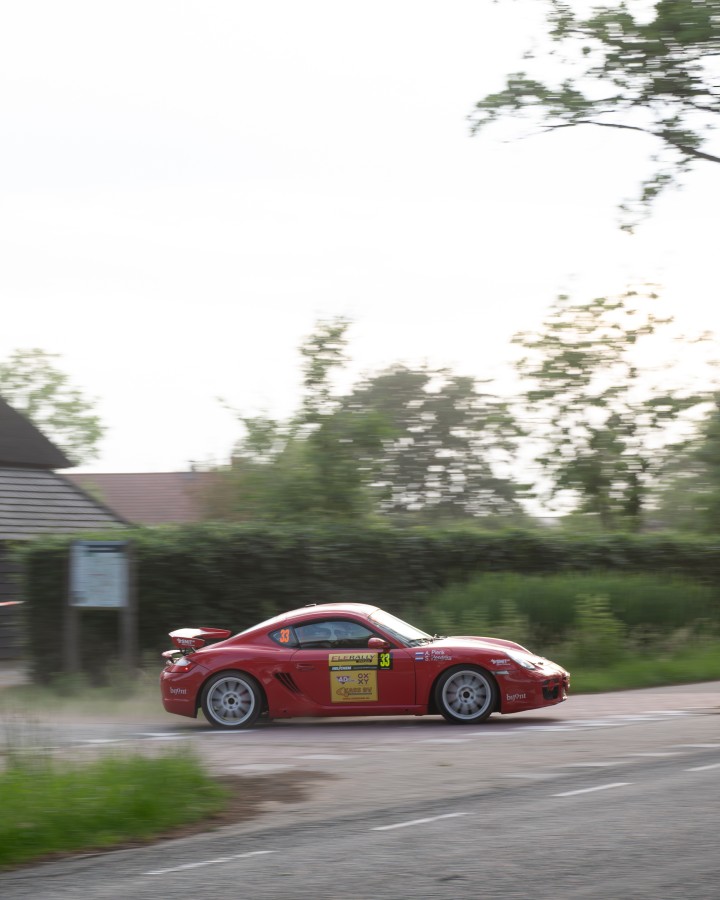 Red Porsche Cayman Rally